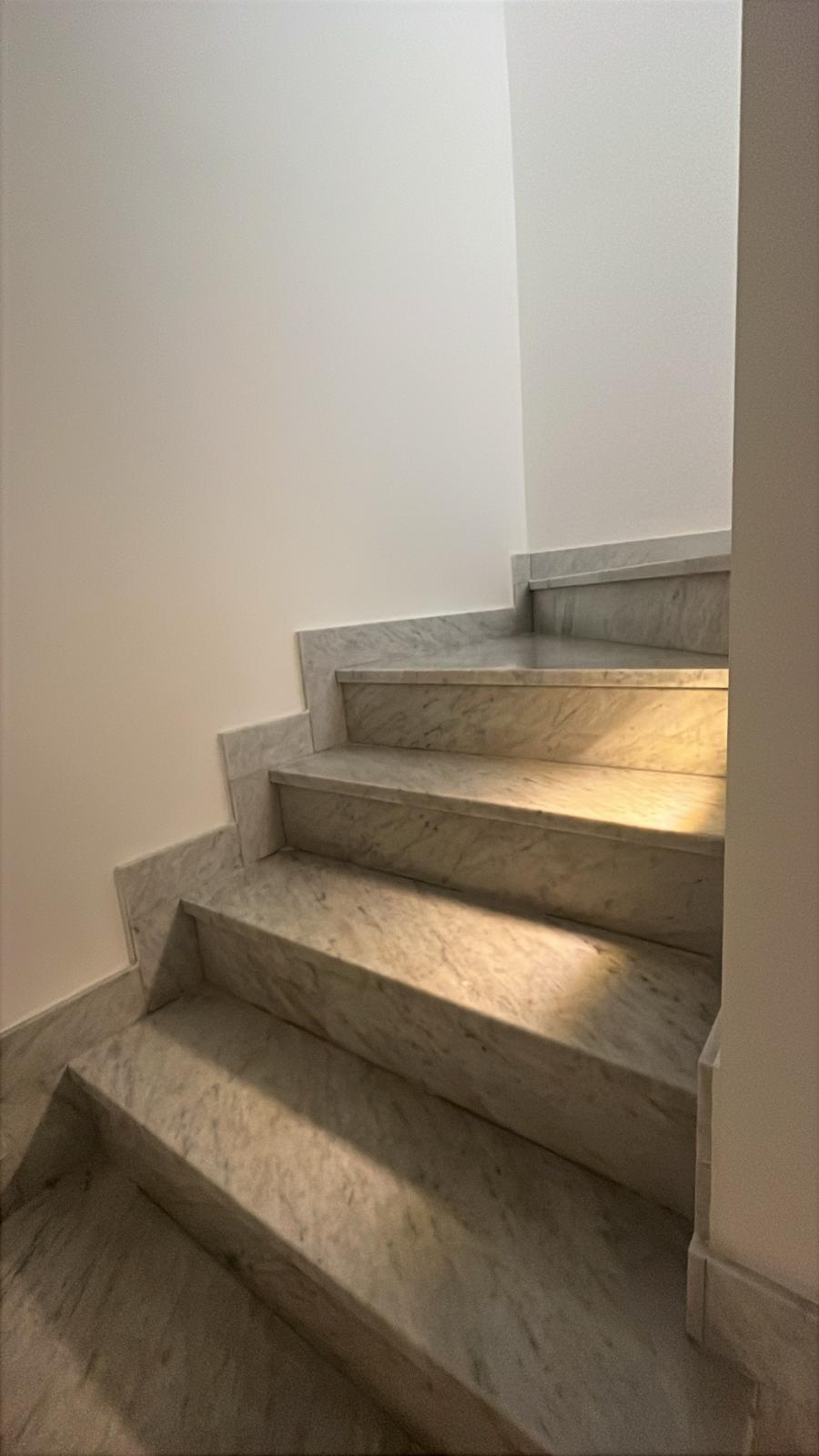 Marble staircase connecting the three floors