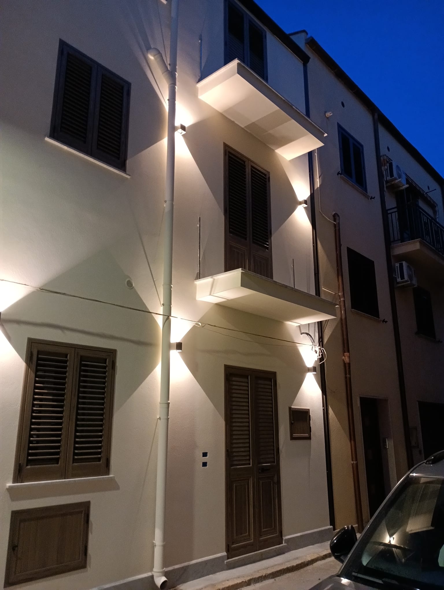 Casa Gigante exterior at night