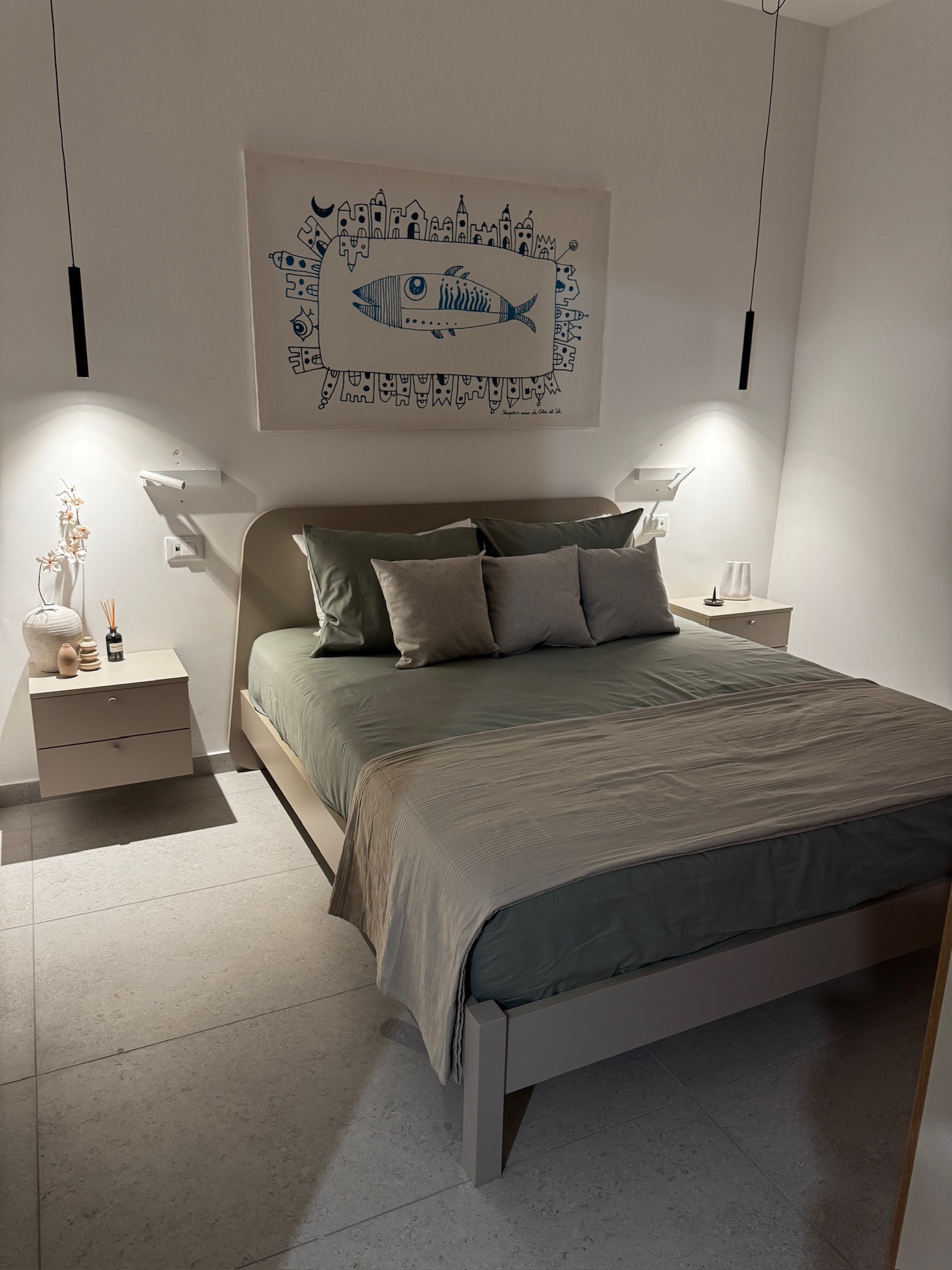 Studio Primo bedroom with sage linens