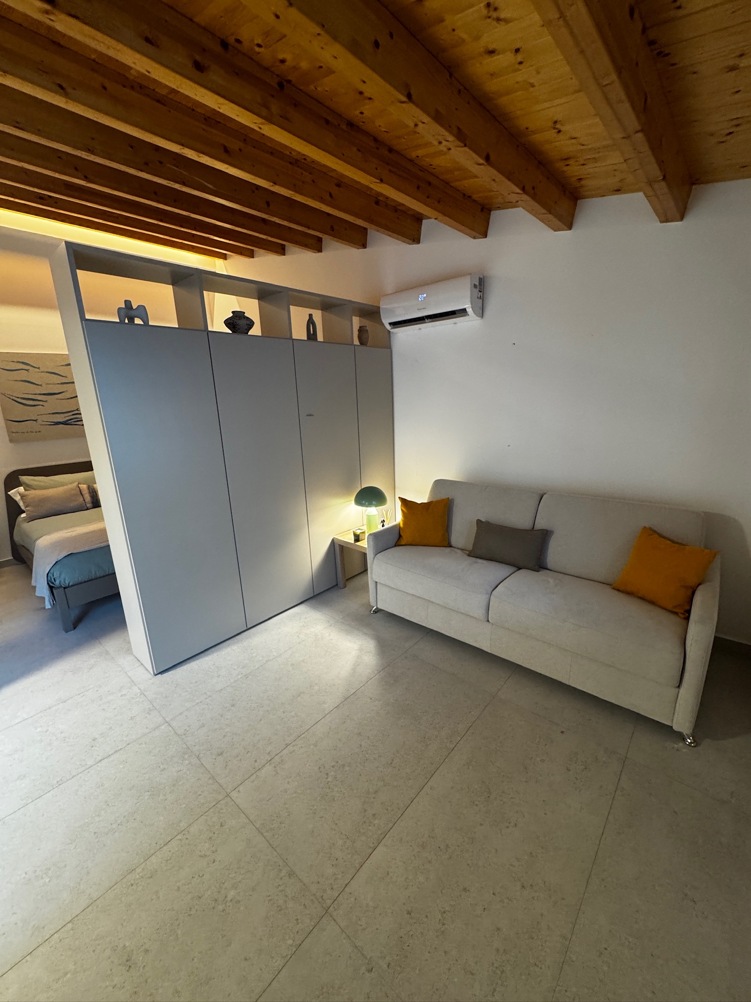 Studio Secondo living area with pull-out couch